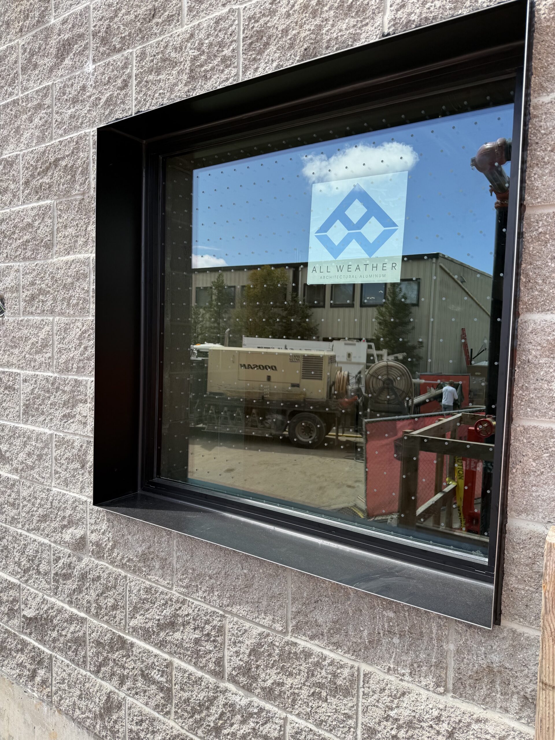 Construction progress showing window installation